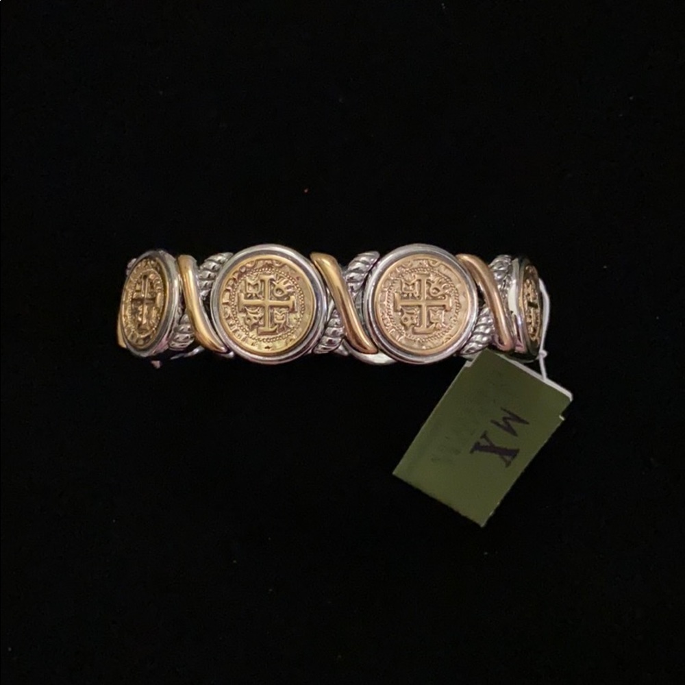 Set of gold and silver clasp bracelets